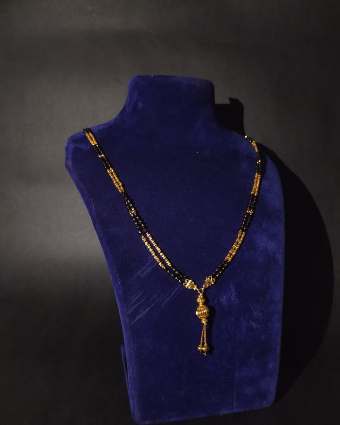 Vati Tassel Mangalsutra, Double-strand black beads with a ball-and-tassel vati
