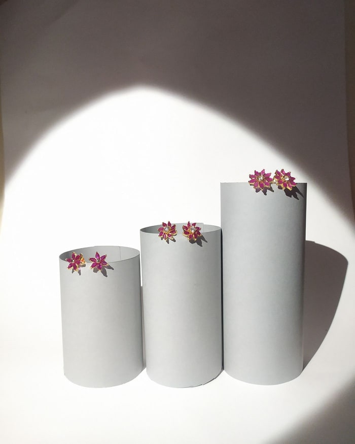 Ruby CZ Floral Stud Trio, Three pairs of ruby and CZ floral studs