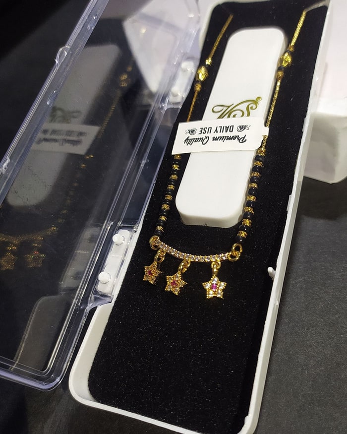 Tara Kemp Mangalsutra, Black-bead chain with a triple star-shaped kemp pendant drop