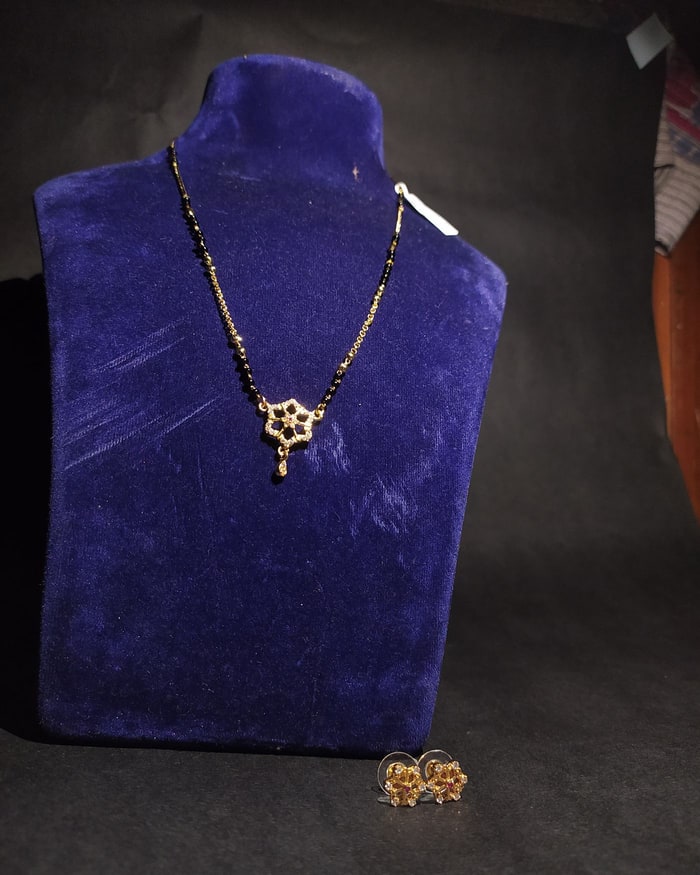 Nakshi Phool Mangalsutra Set, Black-bead chain with a hexagonal floral pendant, matching studs