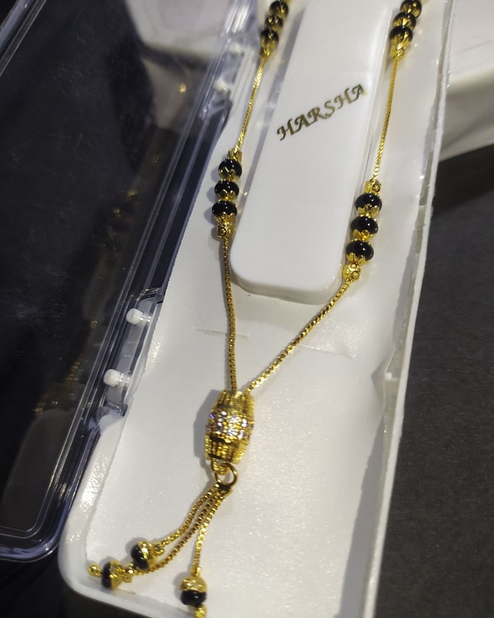 Kemp Vati Bracelet, Adjustable beaded bracelet with a pave centre bead and tassel ends