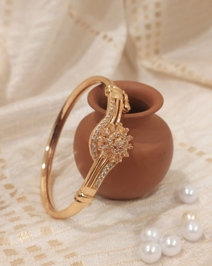 Rose Gold Surya Bracelet, Bypass-style bracelet with a round CZ sunburst medallion