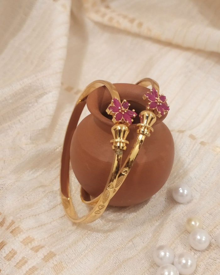 Kemp Phool Kada, Openable cuff bracelet with ruby flower finials, engraved band