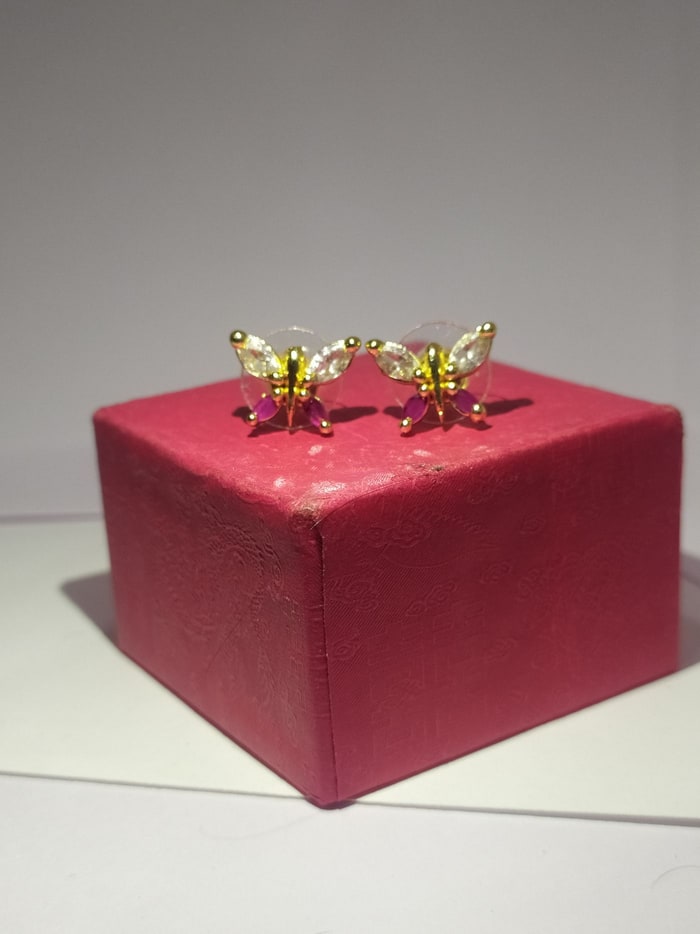 Titli Kemp Studs, Butterfly-shaped studs, marquise CZ and ruby petals