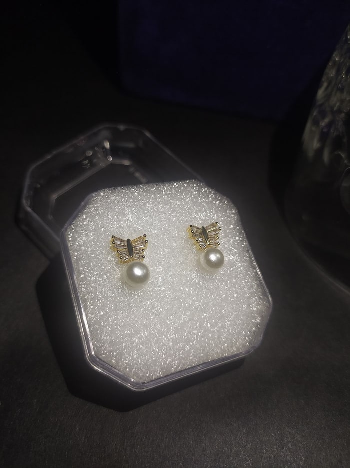 Moti Pankhi Drops, Fan-shaped baguette CZ studs with a hanging pearl drop