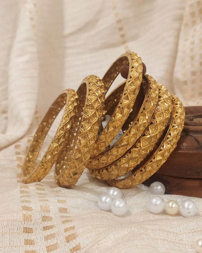 Nakshi Bangadi Set, Checkered diamond-pattern cutwork bangles, fanned set of six