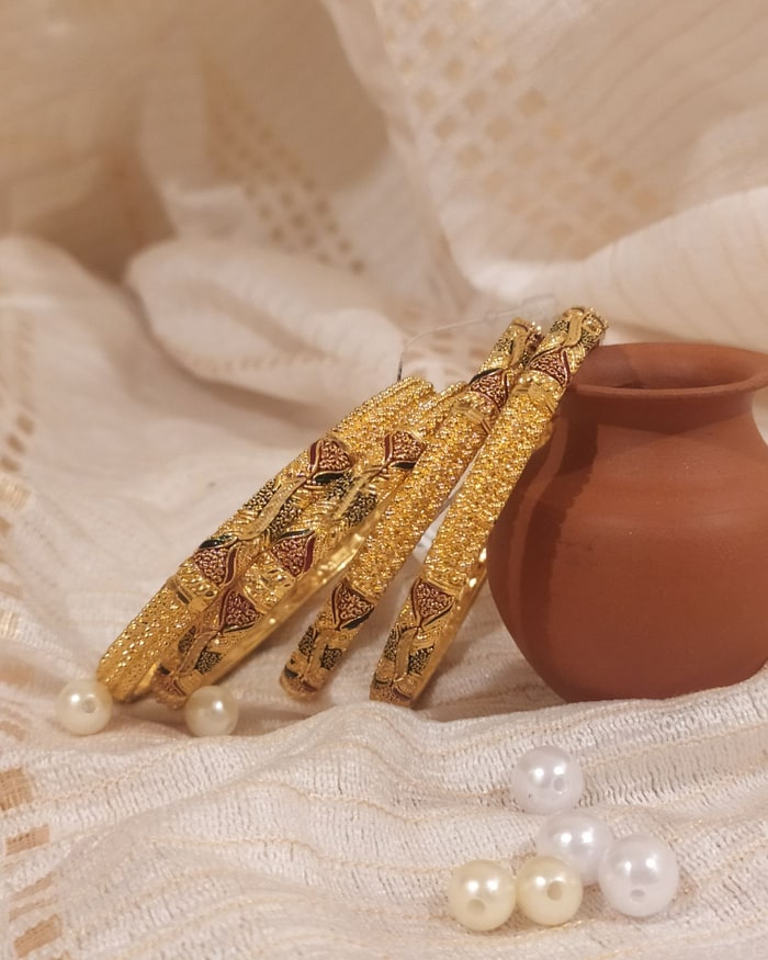 Kemp Mor Kada, Meenakari enamel bangle pair, gold filigree with red and green enamel work